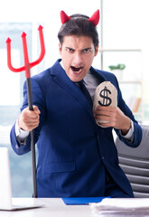 Wall Mural - Devil angry businessman in the office