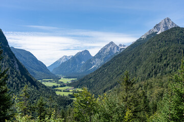 Wall Mural - view on wetterstein mountains and leutasch valley from ederkanzel guest court restaurant in summer