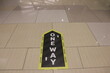 © Aldi - floor with one-way warning sticker. health protocol in the modern market during the new normal