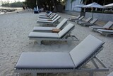 Fototapeta Desenie - chairs on the beach