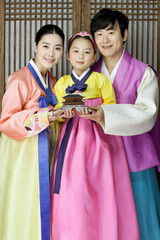 Wall Mural - happy family in korean traditional clothing, hanbok