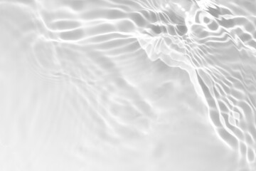 blurred desaturated transparent clear calm water surface texture with splashes and bubbles. trendy a