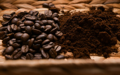 Wall Mural - Close up view of a coffee set-up - fresh beans and ground coffee on a mat basket