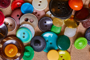 Poster - Background and texture of multicolored antique buttons and sewing tools