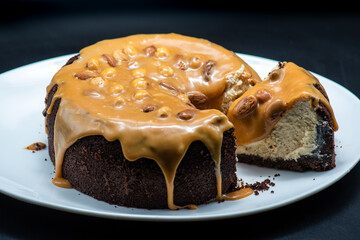 Delicious cheesecake with nut chocolate glaze