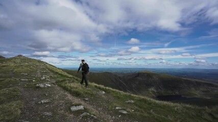 Canvas Print - A man walking the Carneddau mountain ridge in Snowdonia