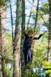 © Image'in - pretty young girl in a tree climbing park