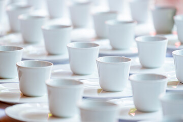 Group of empty coffee cups of white cup for service tea or coffee in breakfast and afternoon tea or buffet and seminar event of catering and cocktail.