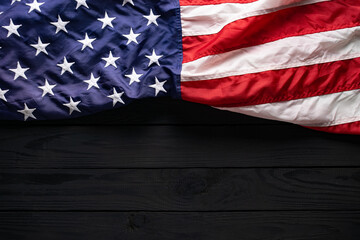 Happy Veterans Day. American flag on black wooden background with copy space.