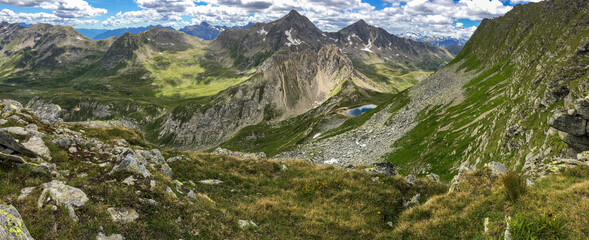 Panoramic view of the Lukmanier pass in Switzerland from the top of Pizzo dell'Uomo.