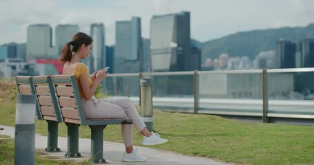 Canvas Print - Woman use of mobile phone at outdoor