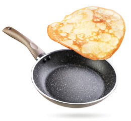 Frying pan and pancake flying on a white background. Isolated