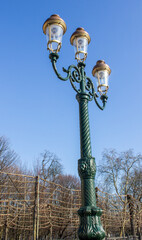 street lamp on blue sky