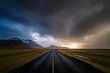© Tandem Stock - View of empty road against stormy clouds