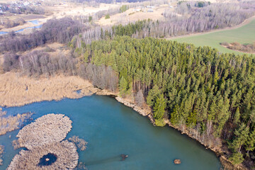 Wall Mural - Drone shot top down view on spring lake