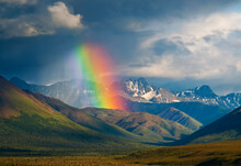 Scenic View Of Rainbow Over Alaska Range In Denali National Park And Preserve