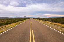Road Passing Through Desert Landscape