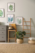 © New Africa - Stylish room interior with decorative ladder and monstera plant