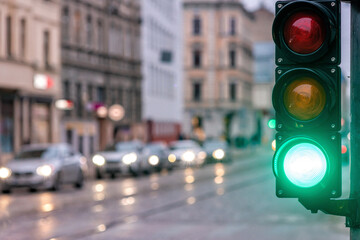 Wall Mural - A city crossing with a semaphore. Green light in semaphore