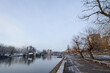 Panorama of the Tamis river, on Pancevo Waterfront in the center of the city, during a cold winter snow sunset. Iconic silos are visible in background. Pancevo, Serbia, one of biggest cities of banat