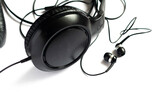 Fototapeta Natura - Large and small headphones on a white background, wire