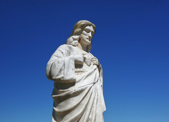 Old stone catholic Jesus Christ statue 