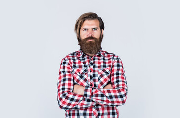 mature hipster with beard. brutal caucasian guy with moustache. bearded man wear checkered shirt. confident and handsome brutal man. male barber care. hair and beard care