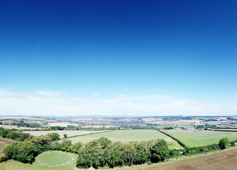 Wall Mural - landscape image of the rollright stone in the countryside