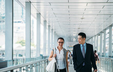 Entrepreneurs Walking Together And Talking Stock Photo