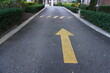 © Benjamin Huang - sign on the road with arrow direction away from you