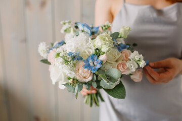 Wall Mural - woman with a bouquet of flowers