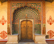 Lotus gate door in pink city at City Palace of Jaipur, India