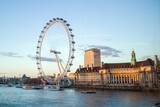 Fototapeta Londyn - London England along Thames river at sunset