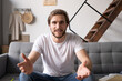 © opolja - Young guy speaking recording vlog at home looking at camera webcam, male vlogger talking shooting video blog webinar making online call, communicating having distant job interview e-coaching teaching