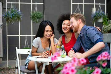 Poster - Young friends having a great time together. Group of people talking and smiling.