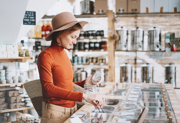 Wall Mural - Woman buying products in plastic free grocery store