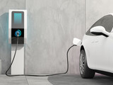 Fototapeta Przestrzenne - Futuristic electric car connected to the charging station to charge the battery against the background of a concrete wall. 3d render.