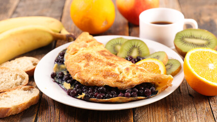 Sticker - omelette with blueberries, fruit and coffee cup