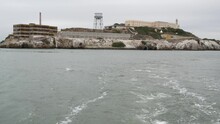 Alcatraz Island In San Francisco Bay, California USA. Federal Prison For Gangsters On Rock, Foggy Weather. Historic Jail, Cliff In Misty Cloudy Harbor. Gaol For Punishment And Imprisonment For Crime