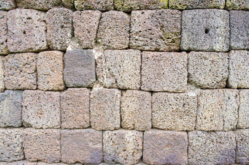 The old stones of castle, stacked together to make a castle, ancient stone castle in Thailand.