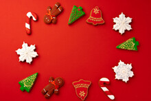Christmas Gingerbread Cookies On Red Background Top View
