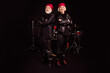 © deagreez - Full length photo of two pensioners family cool aged lady man rock group all life together concert show drum instruments wear trendy rocker leather outfit isolated black color background