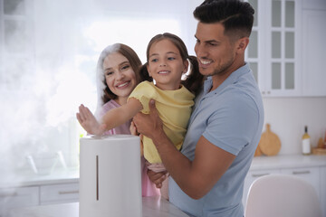 Poster - Family in kitchen with modern air humidifier