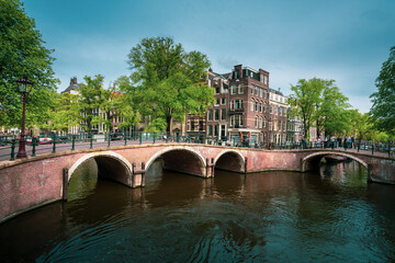 Wall Mural - Amsterdam canals with bridge and typical houses, Holland