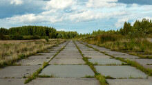 Runway Of An Abandoned Military Airfield