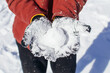 © Dominique Felicity Photography/Stocksy - Man holding a snowball