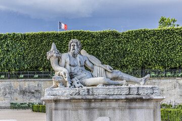 Sculpture in public Tuileries garden in Paris. Tuileries Garden created by Catherine de Medici in 1564. Paris, France.