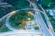 Aerial View Of Higway Road And Movement Vehicle In Chiang Mai City Of Thailand At Twilight.