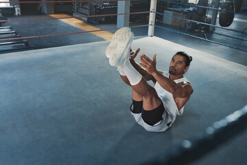 Canvas Print - Gym. Man Doing Abs Workout On Boxing Ring. Asian Sportsman Exercising On Floor At Sports Center. Portrait Of Sexy Handsome Guy With Strong, Healthy, Muscular Body Warming Up Indoor.