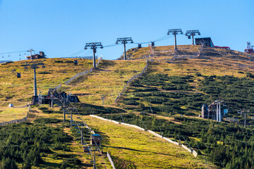 Wall Mural - Ski lift chairs and cableways in resort Jasna in Low Tatras mountains, Slovakia